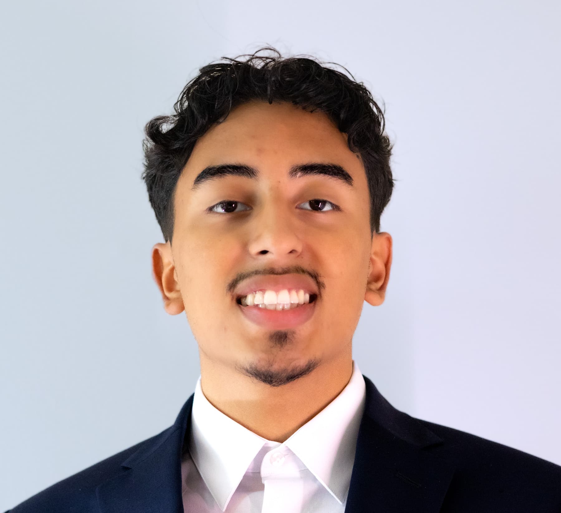 Mario Auqui professional headshot portrait